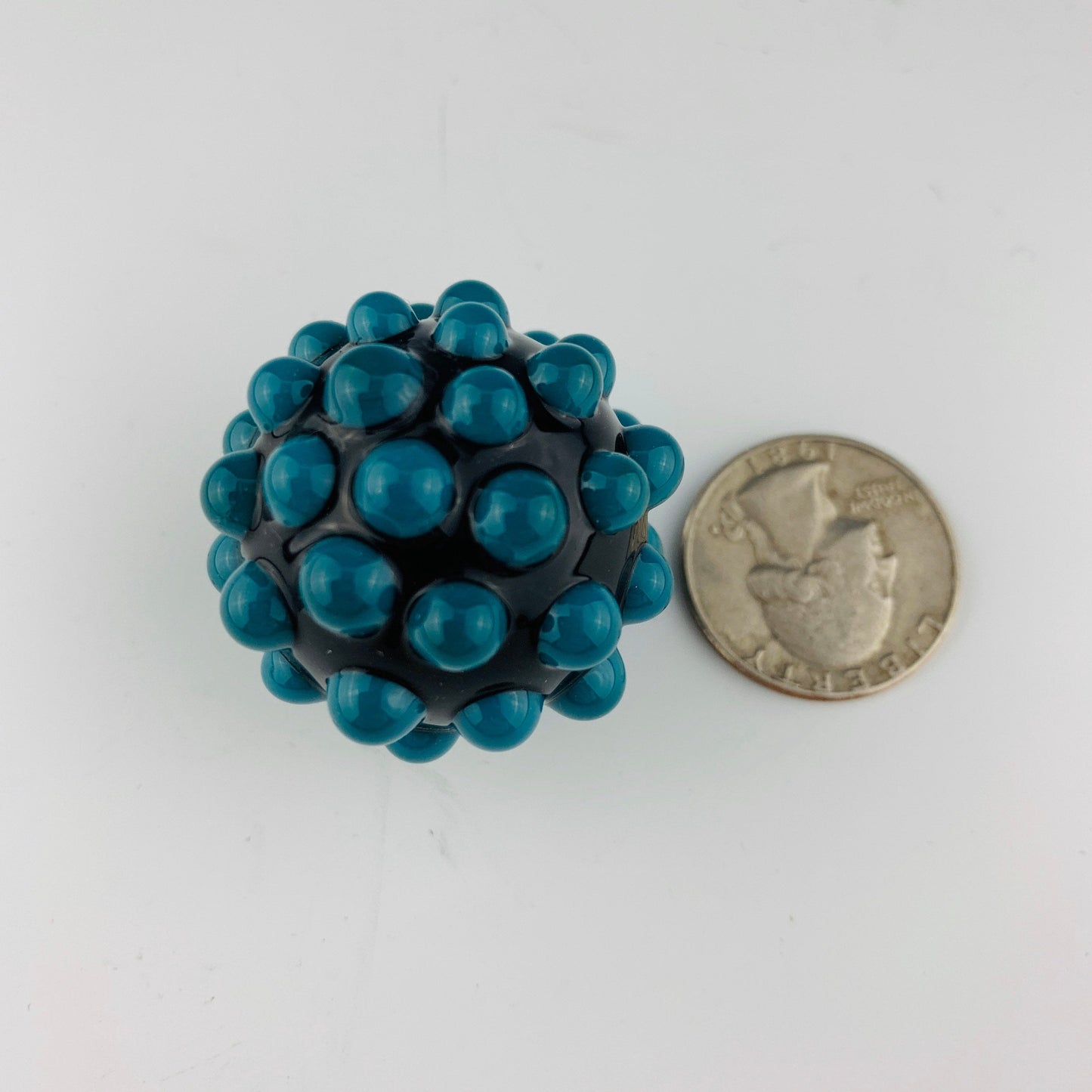 Mármol con clavos verde azulado