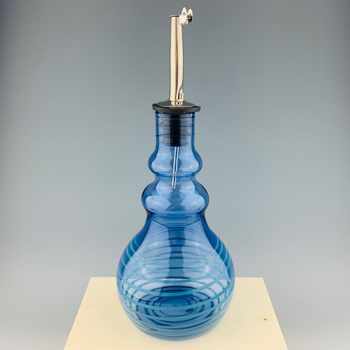 Brilliant Blue and Teal Oil Bottle