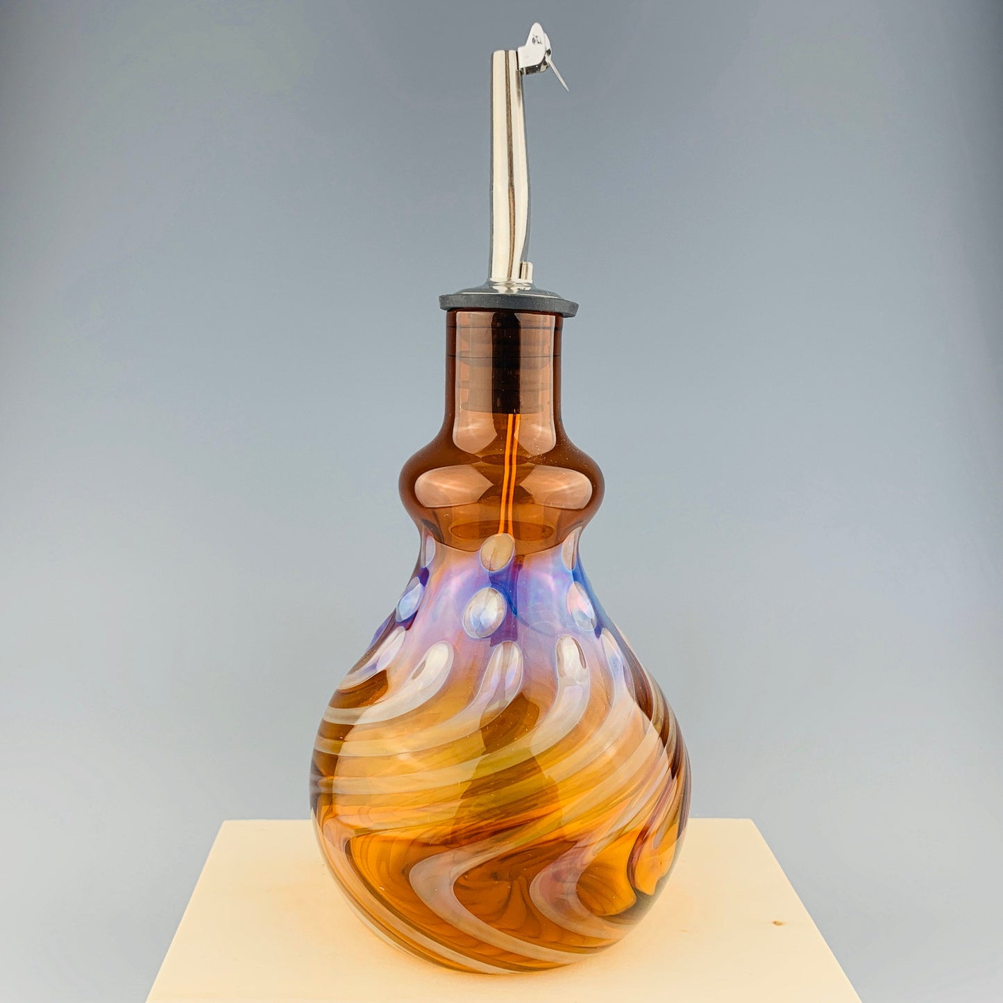 Amber and Silver Oil Bottle