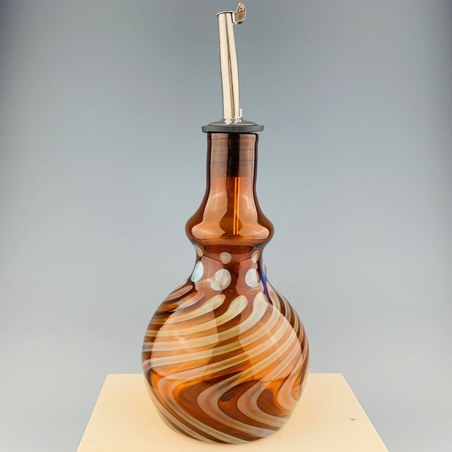 Amber and Silver Oil Bottle